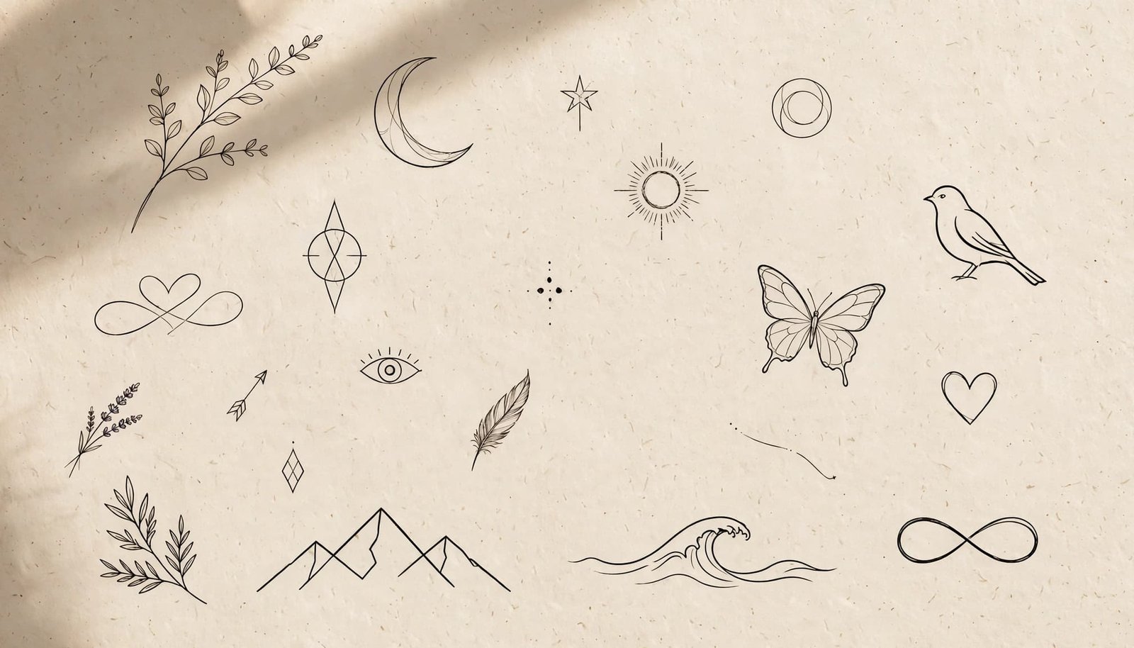 Minimalist black ink tattoo sketches arranged on cream paper.